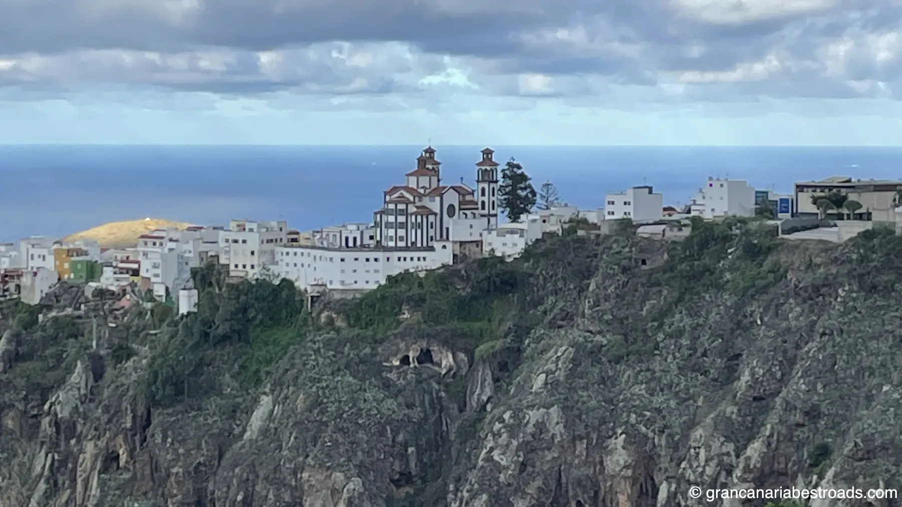 The distinctive church of Moya, perched high above the ravine of the same name
