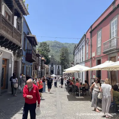 The main street leading to the square, and its traditional shops