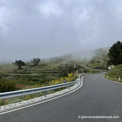 GC-220: a stretch of road winding through rolling hills