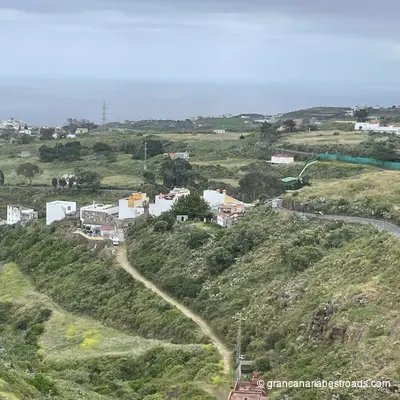 GC-70: Winding stretches and clusters of houses along the road