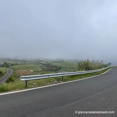GC-710: A winding road and rolling hills amid the clouds